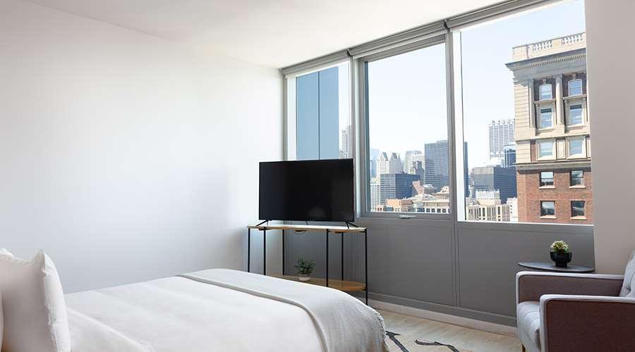 시카고 Sentral Michigan Avenue 아파트 호텔 객실 사진 A bedroom at 100 East 14th Street